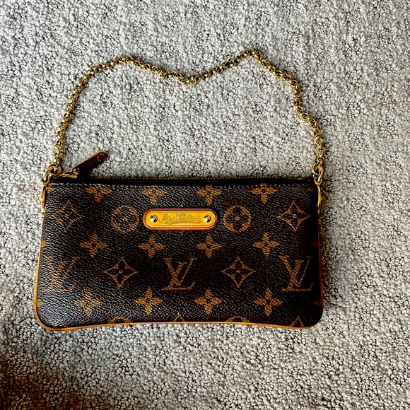 Authentic Louis Vuitton Milla - Picture 1 of 13